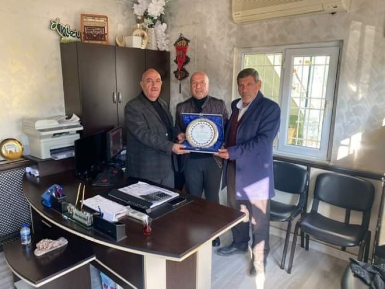 Aslan ve Kök'ten Hayırsever İşadamı Yakar'a Plaket