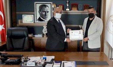 Hasan Yazar'a Üstün Başarı Belgesi