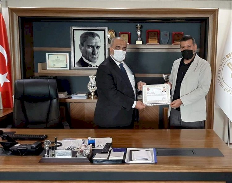 Hasan Yazar'a Üstün Başarı Belgesi