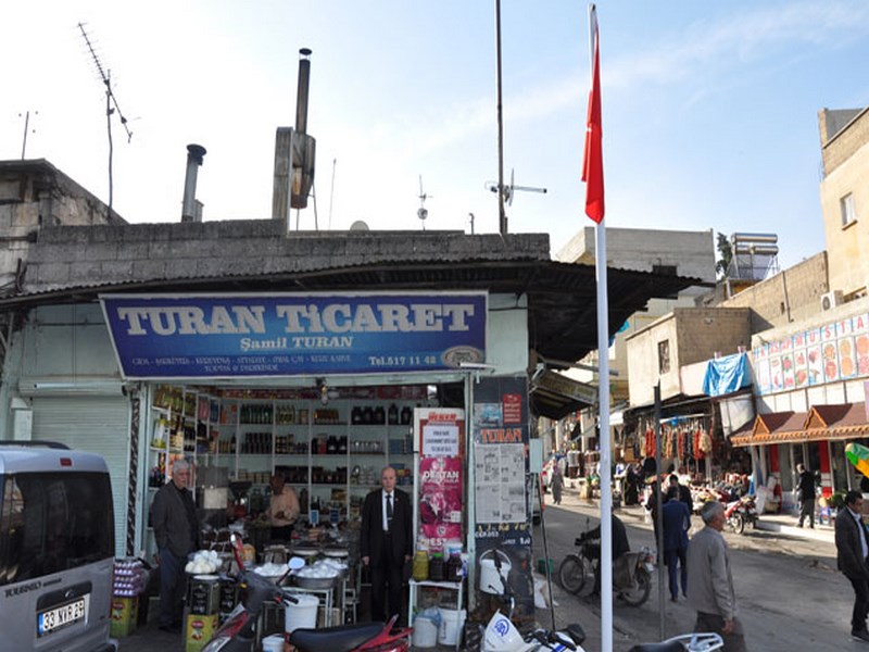 BÜYÜKŞEHİR BELEDİYESİ NDEN MUHTARLARA BAYRAK