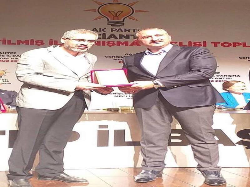 LÇE BAŞKANI UZUNASLAN´A PLAKET